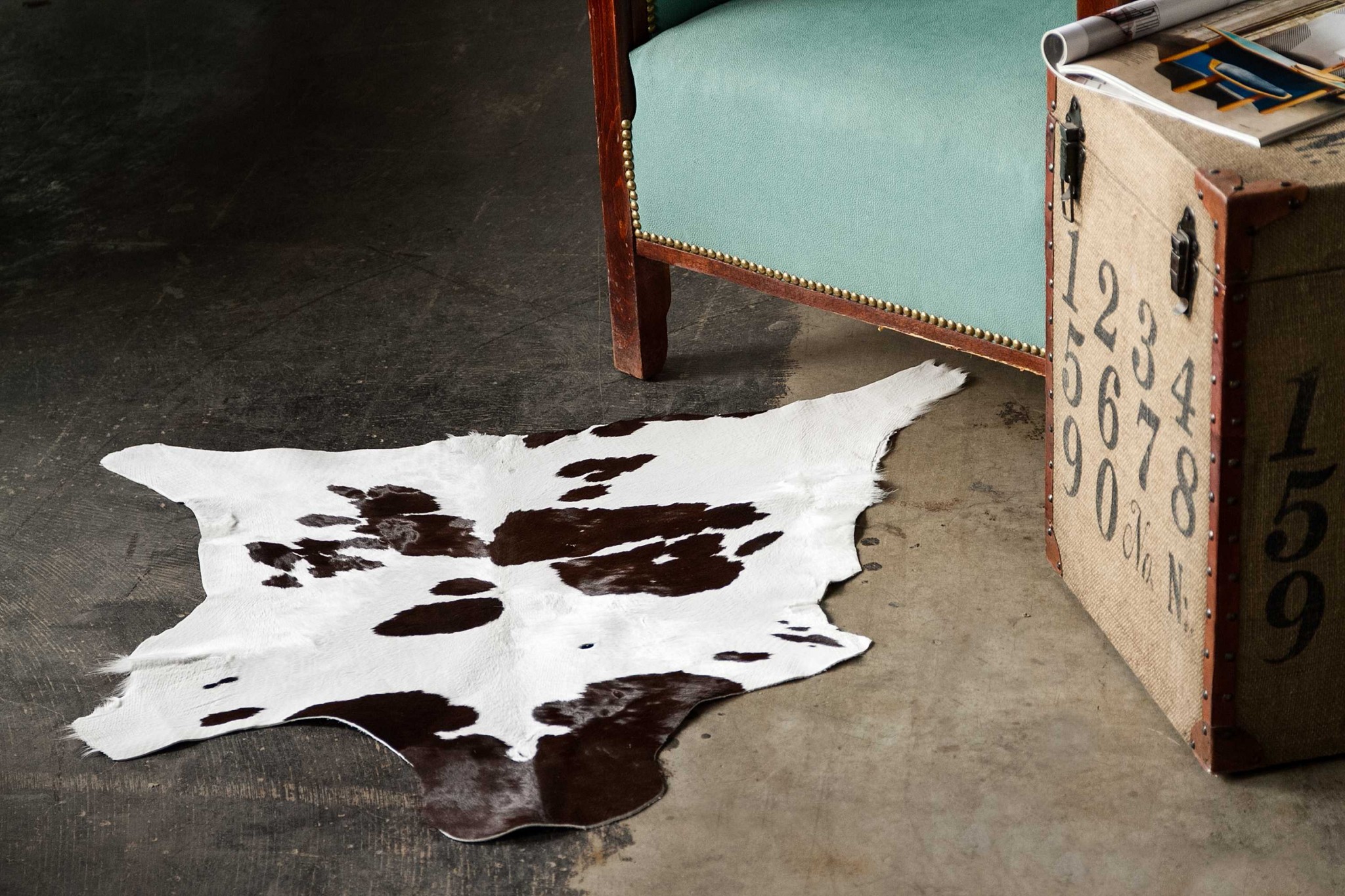 2" X 3" Brown and White Cowhide Hand Woven Area Rug