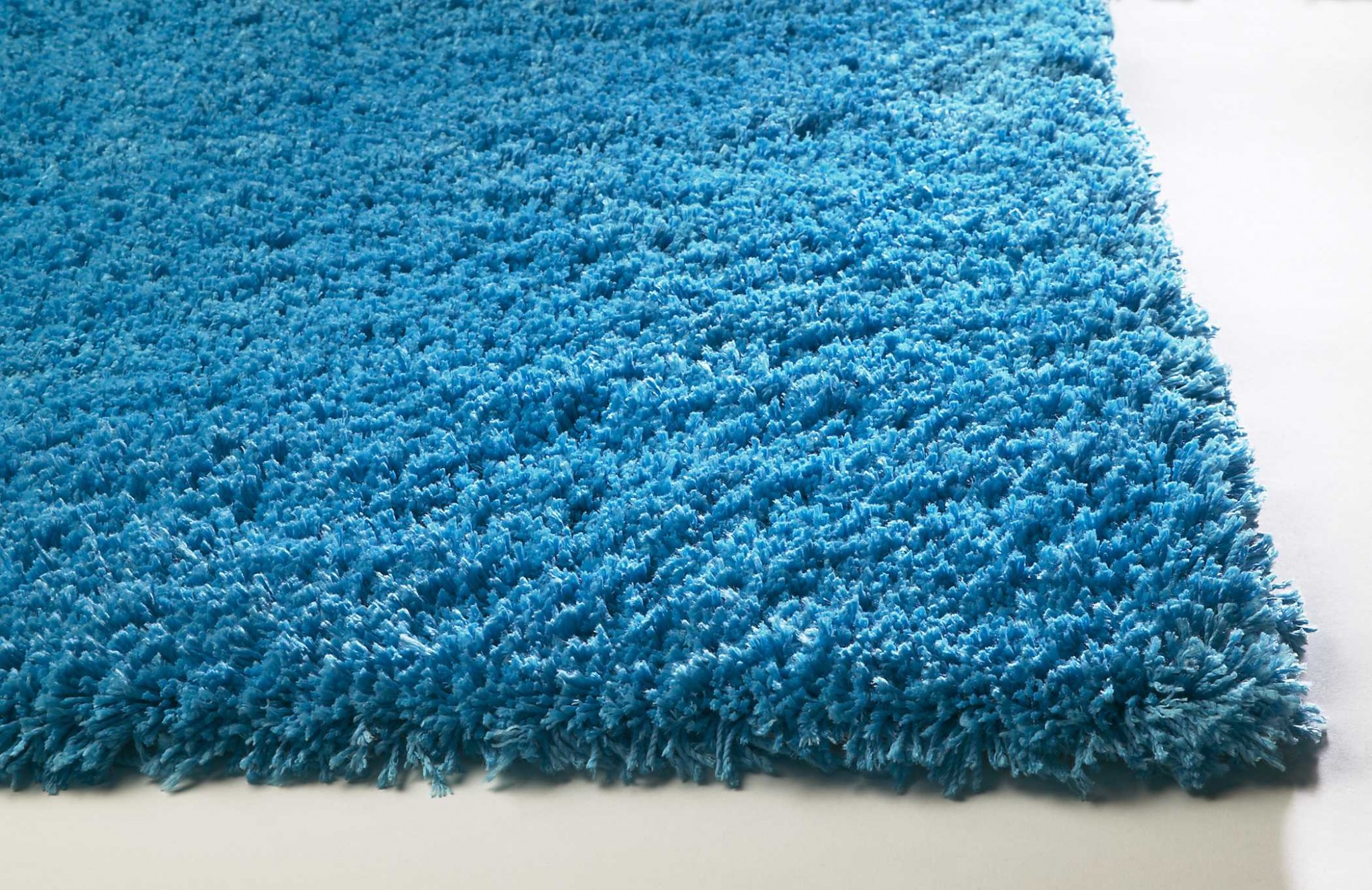 9' x 13' Polyester Highlighter Blue Area Rug