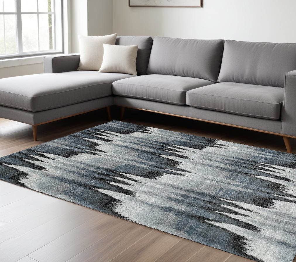 8" X 11" Ivory Blue and Gray Abstract Area Rug