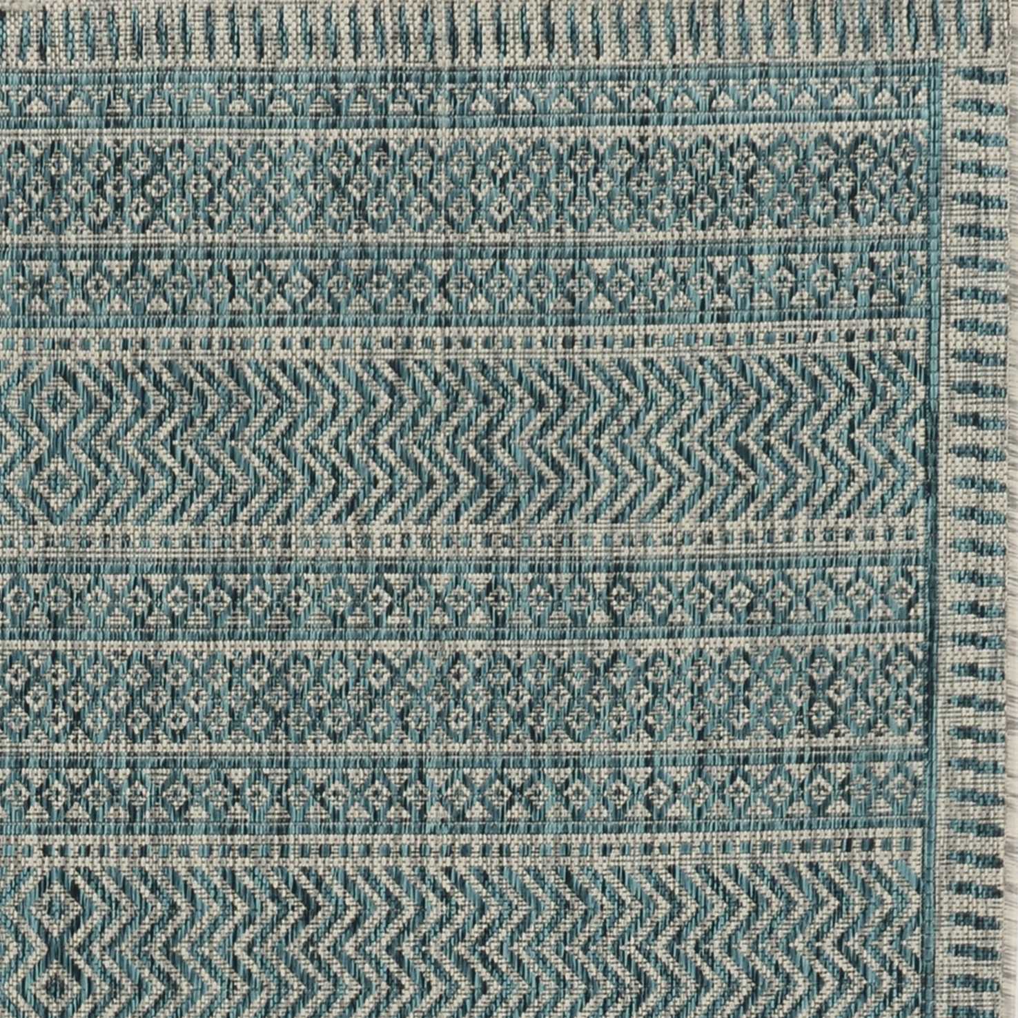 63" X 91" Teal Polypropylene Rug