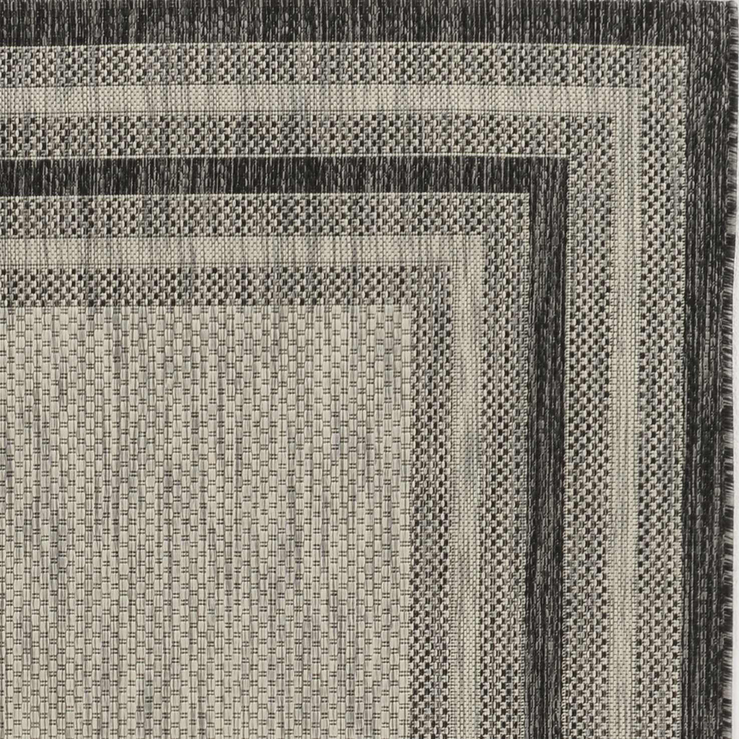 63" X 91" Grey Polypropylene Rug