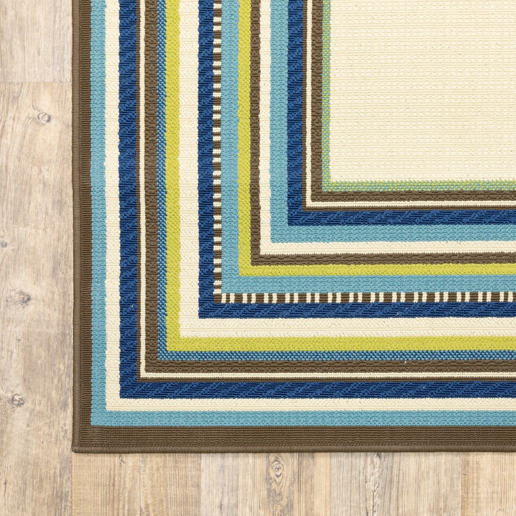 4' x 6' Ivory Mediterranean Blue and Lime Border Indoor Outdoor Area Rug