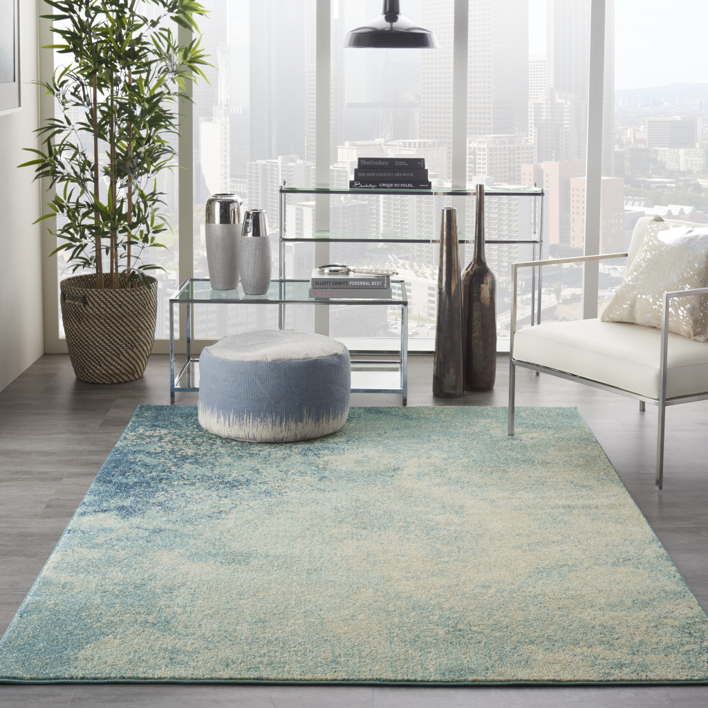 5" X 7" Ivory And Blue Abstract Power Loom Area Rug