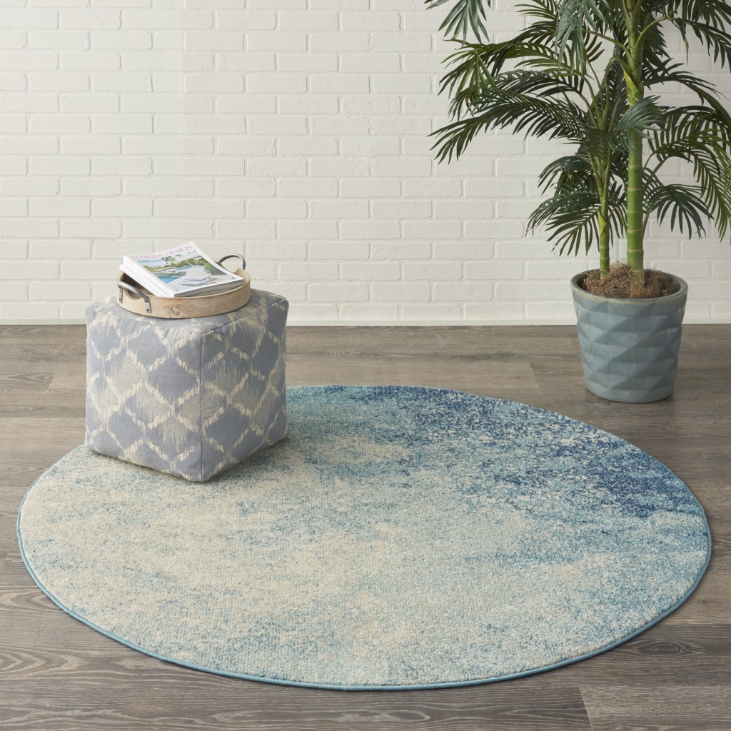 4 Round Light Blue and Ivory Abstract Sky Area Rug