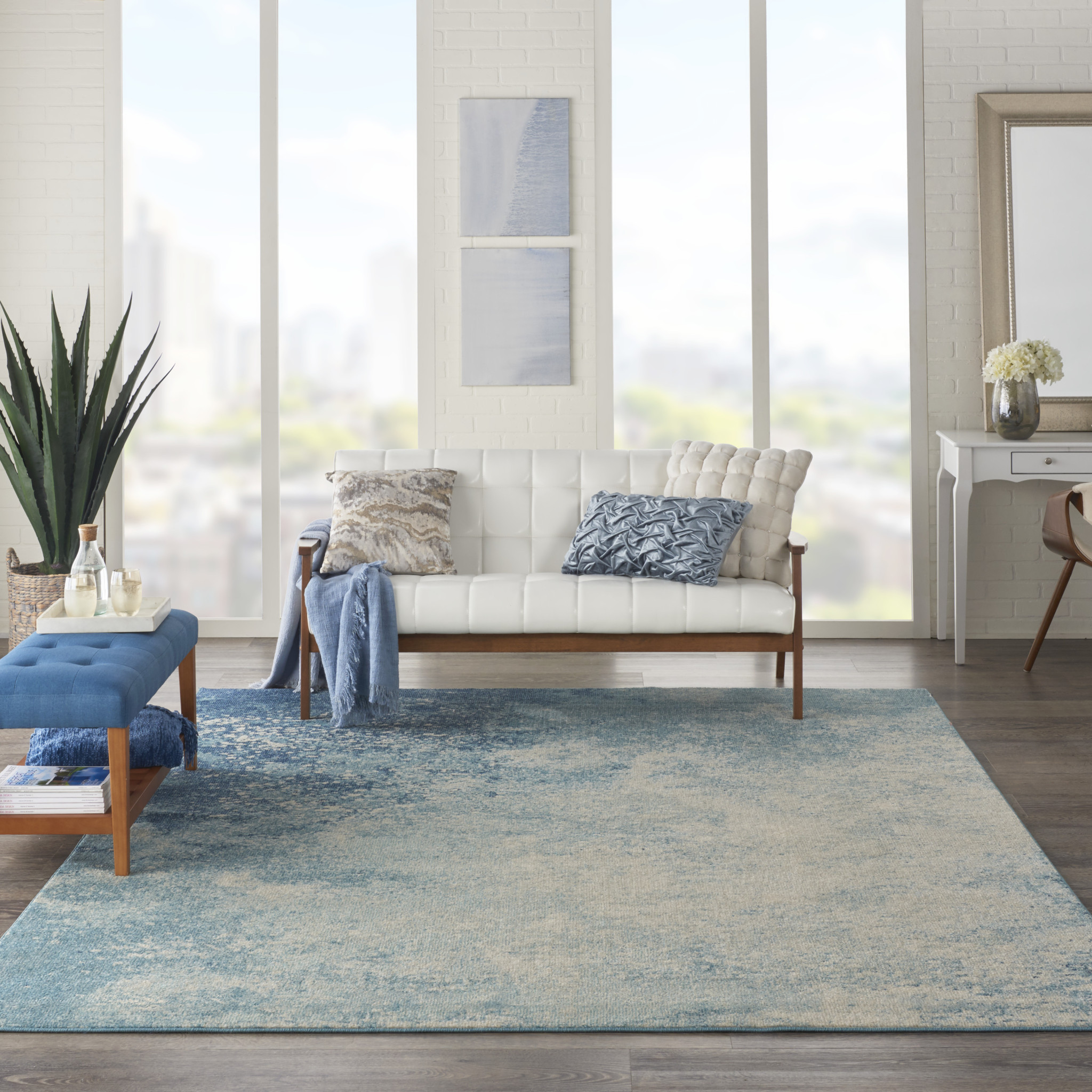 7" X 10" Ivory And Blue Abstract Power Loom Area Rug