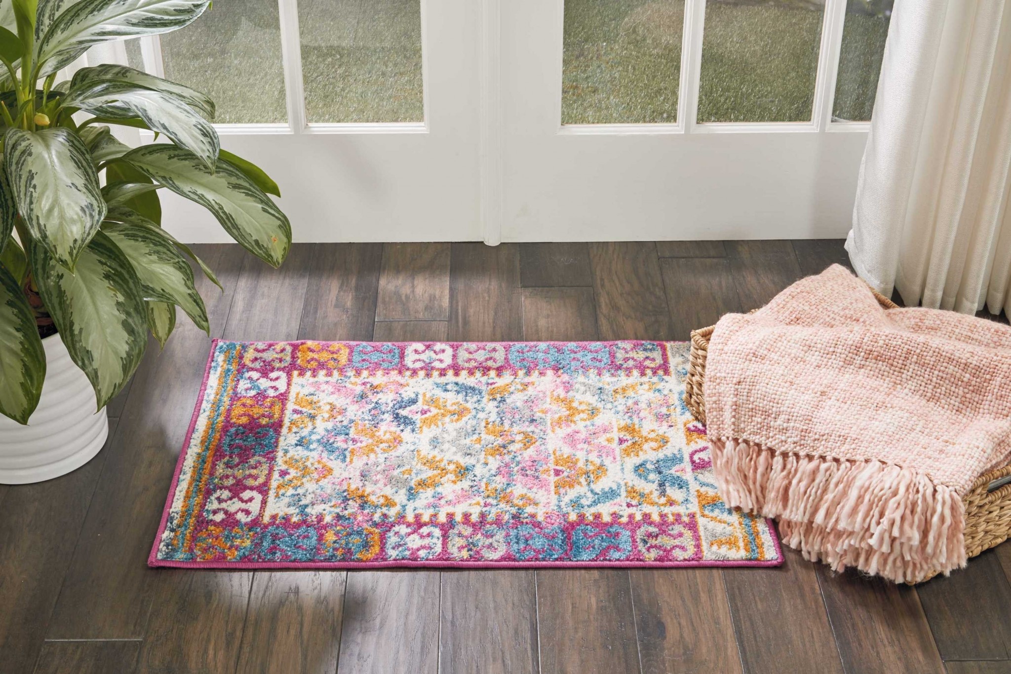2 x 3 Ivory and Magenta Tribal Pattern Scatter Rug