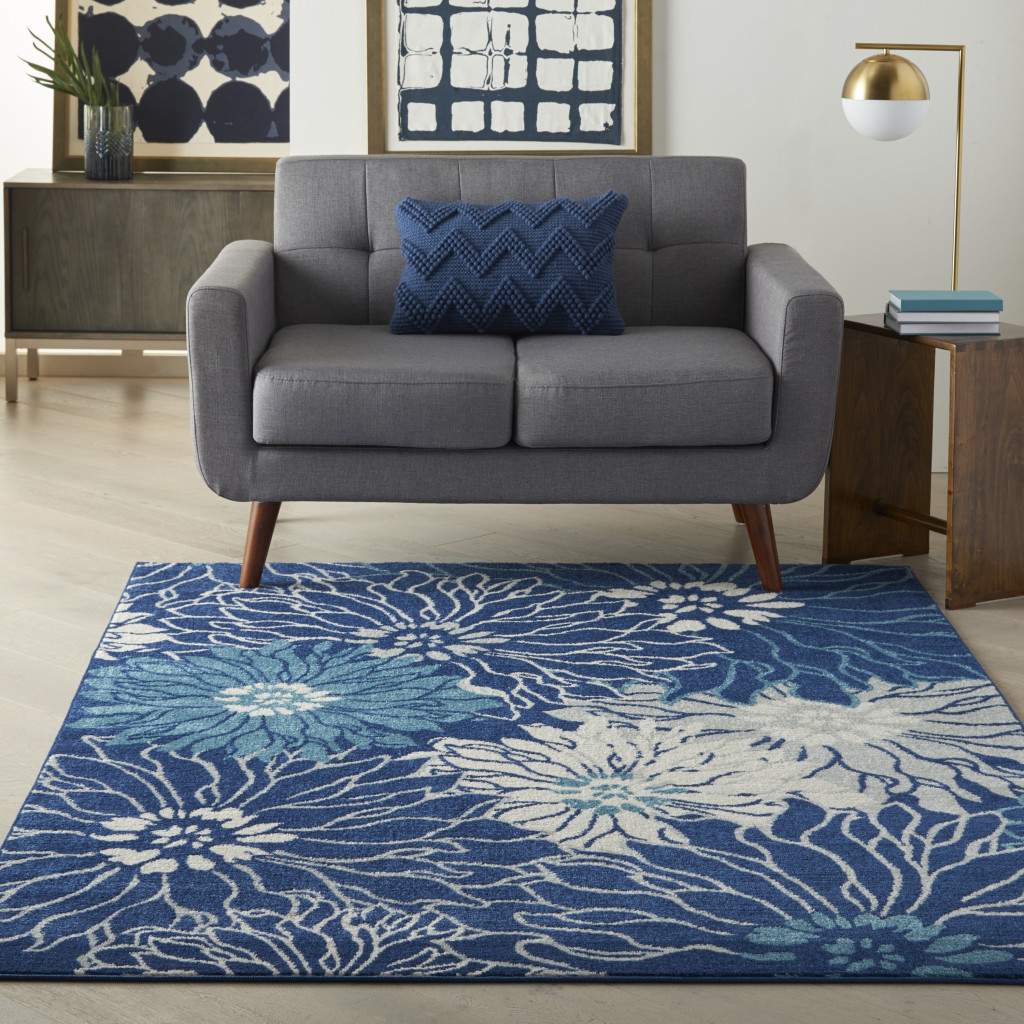 5" X 7" Blue And Ivory Floral Power Loom Area Rug