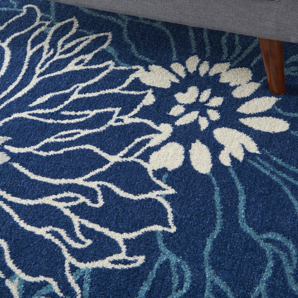 5" X 7" Blue And Ivory Floral Power Loom Area Rug