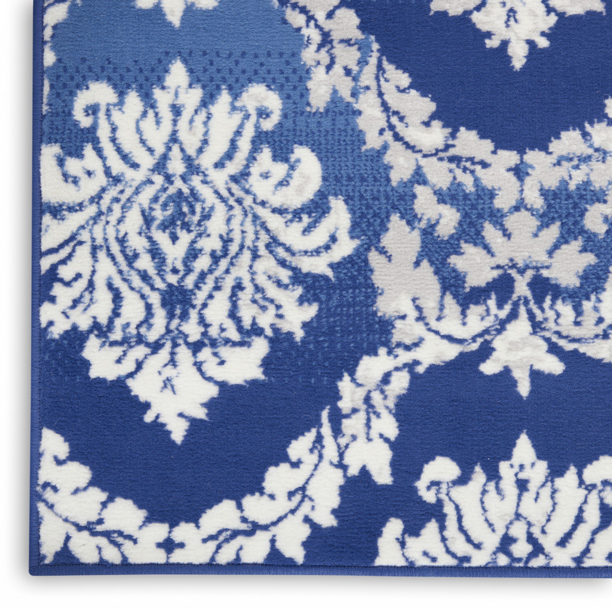 5 x 7 Blue and Ivory Damask Area Rug