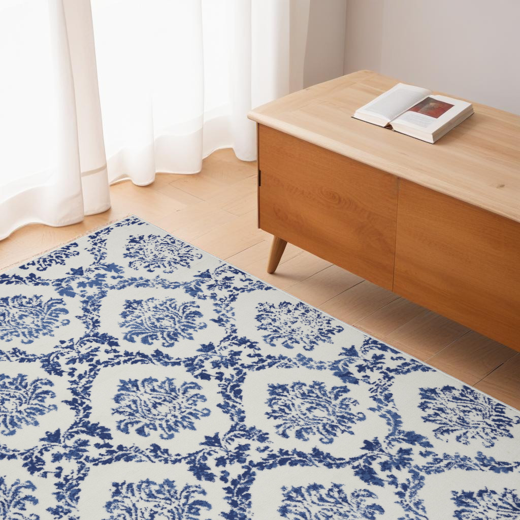 4" X 6" Blue And Ivory Floral Dhurrie Area Rug