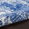 5" X 7" Blue And Ivory Abstract Dhurrie Area Rug