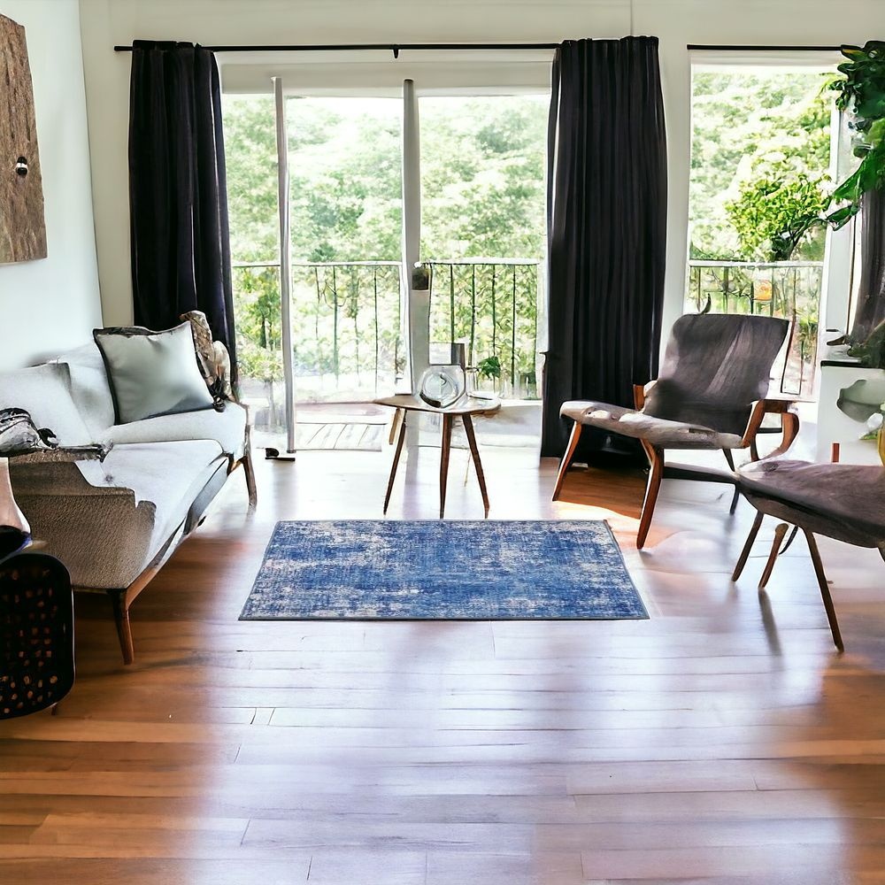 6" X 9" Blue And Ivory Abstract Dhurrie Area Rug