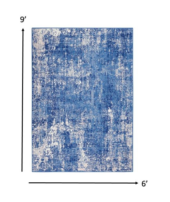 6" X 9" Blue And Ivory Abstract Dhurrie Area Rug