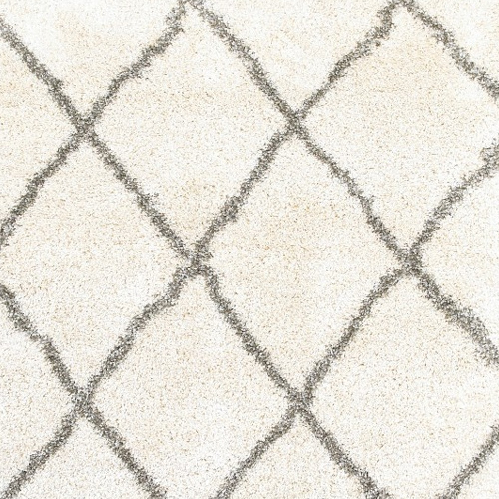 7" X 10" Ivory And Gray Geometric Lattice Area Rug