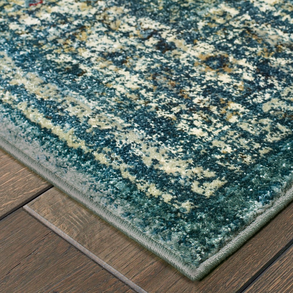 10" X 13" Peacock Blue And Ivory Indoor Area Rug