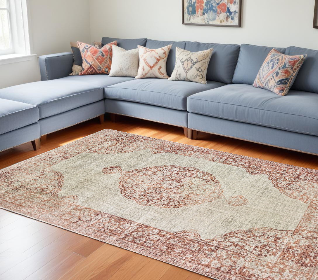 10" X 13" Ivory And Pink Medallion Area Rug