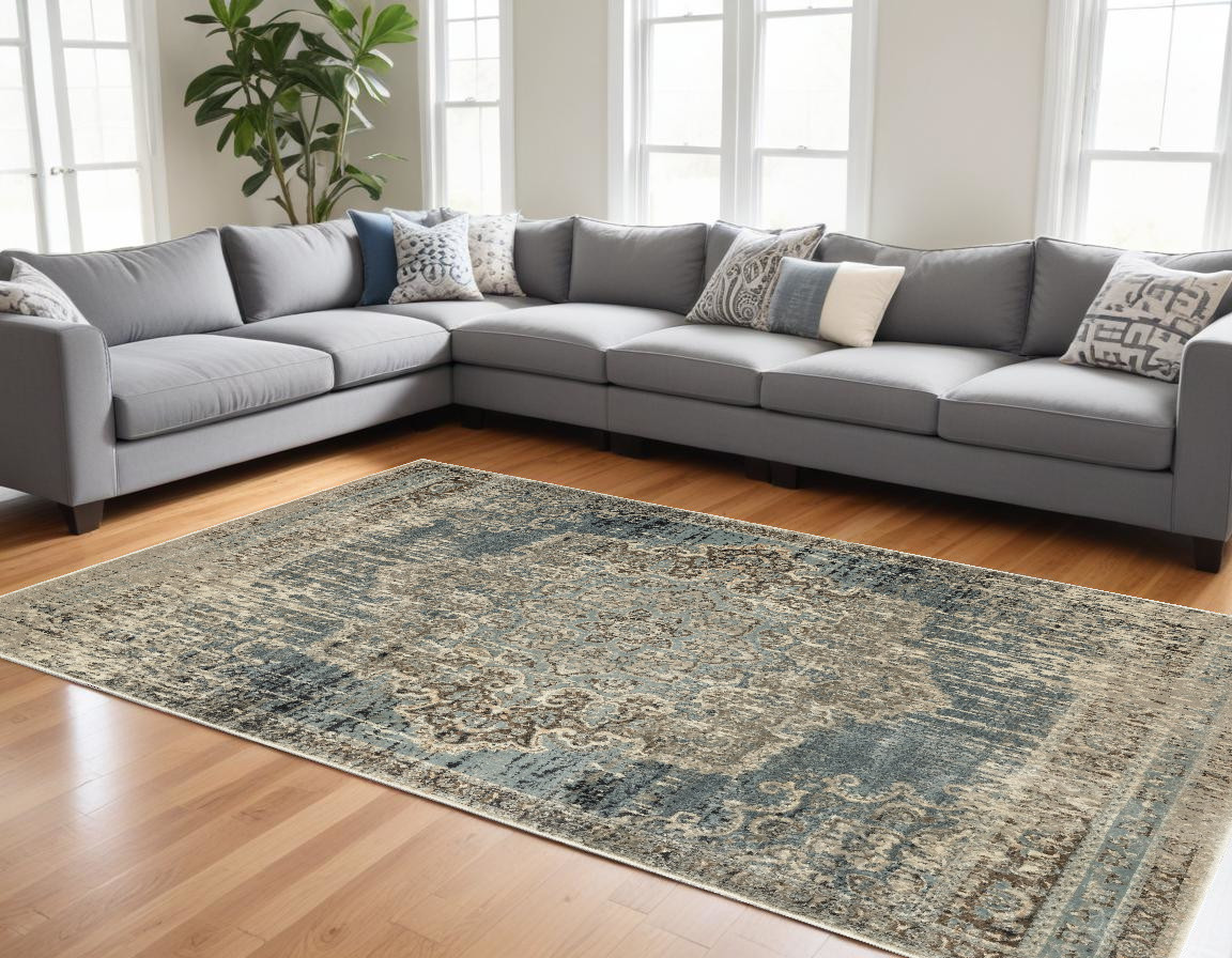 10" X 13" Blue And Ivory Medallion Area Rug