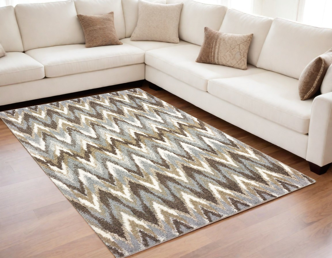 5" X 8" Gray And Taupe Ikat Pattern Area Rug
