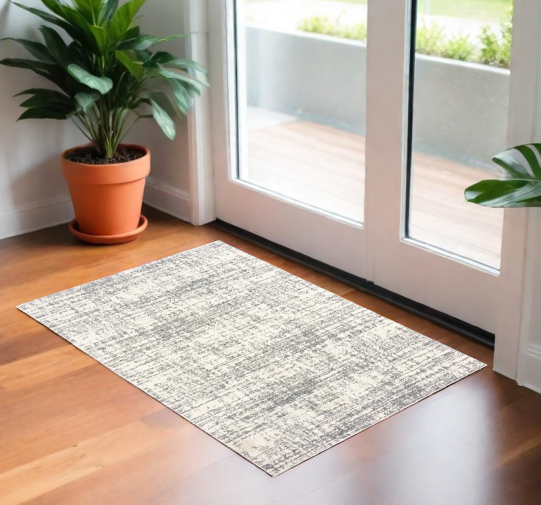 2" X 3" Gray and Ivory Shag Power Loom Area Rug