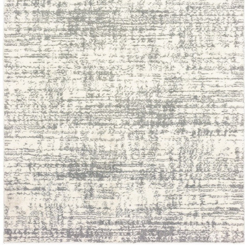 2" X 3" Gray and Ivory Shag Power Loom Area Rug