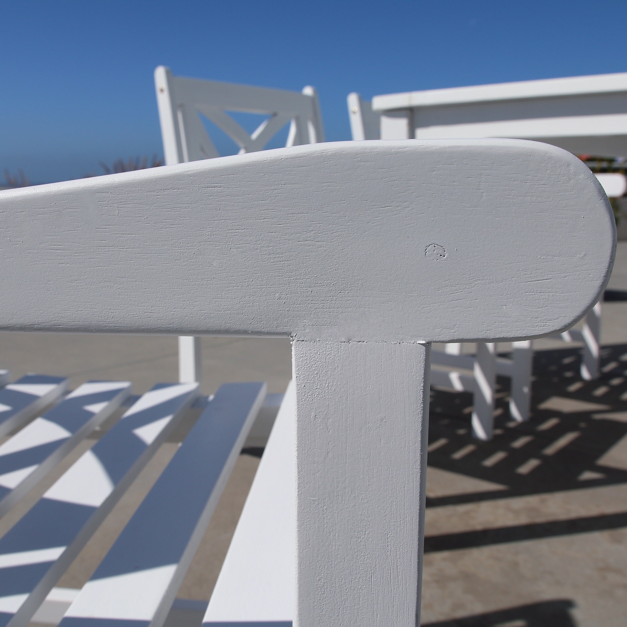 White Patio Armchair with Decorative Back