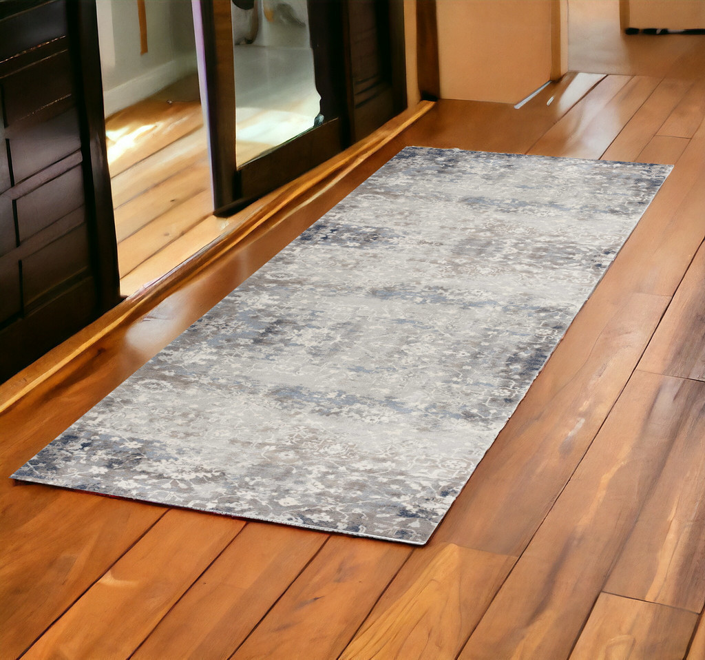 2" X 5" Navy And Beige Distressed Vines Area Rug