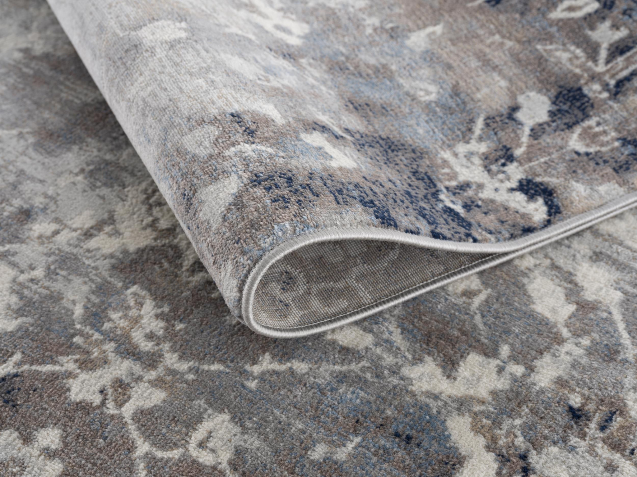 2" X 6" Navy And Beige Distressed Vines Area Rug