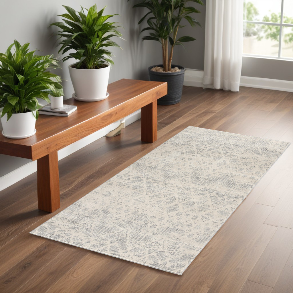 2" X 5" Ivory and Gray Ikat Power Loom Distressed Area Rug
