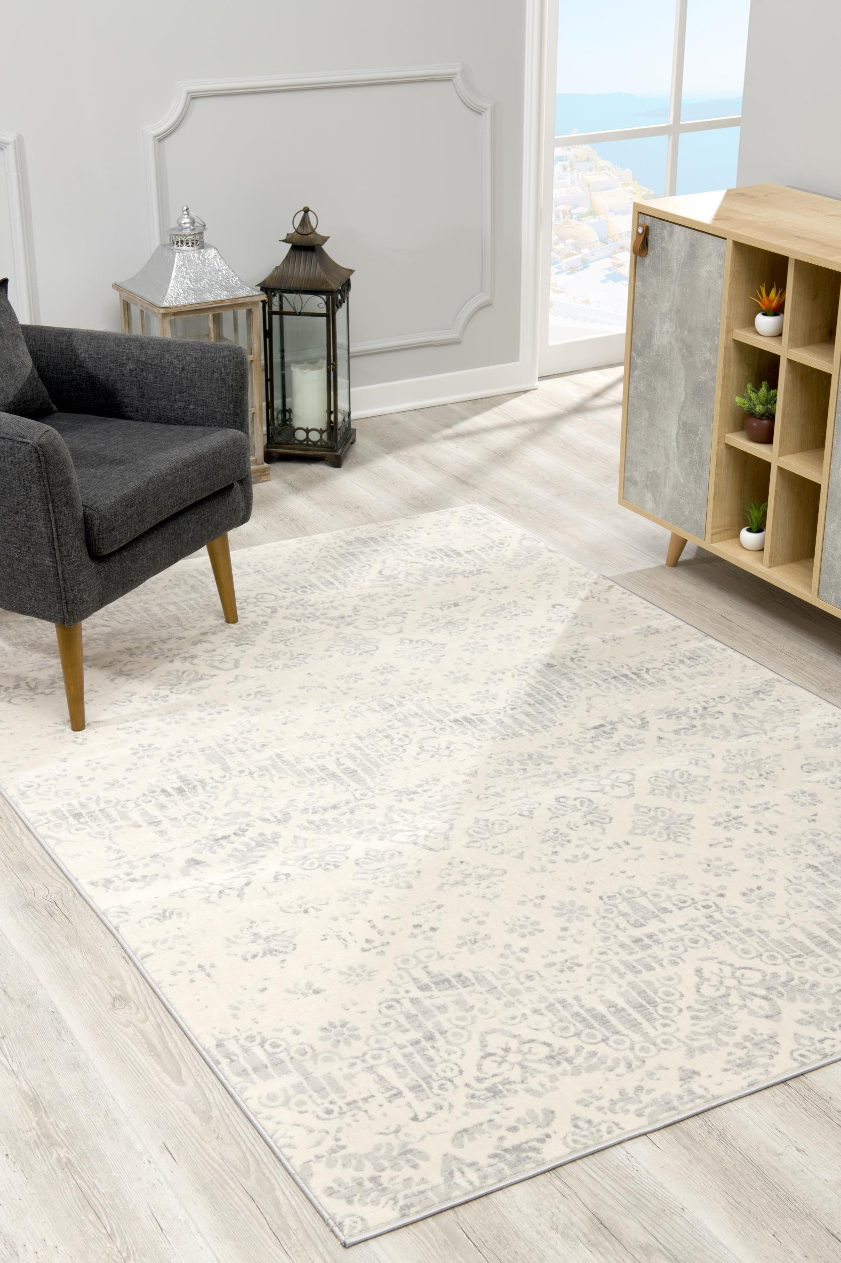 8" X 11" Ivory Distressed Ikat Pattern Area Rug