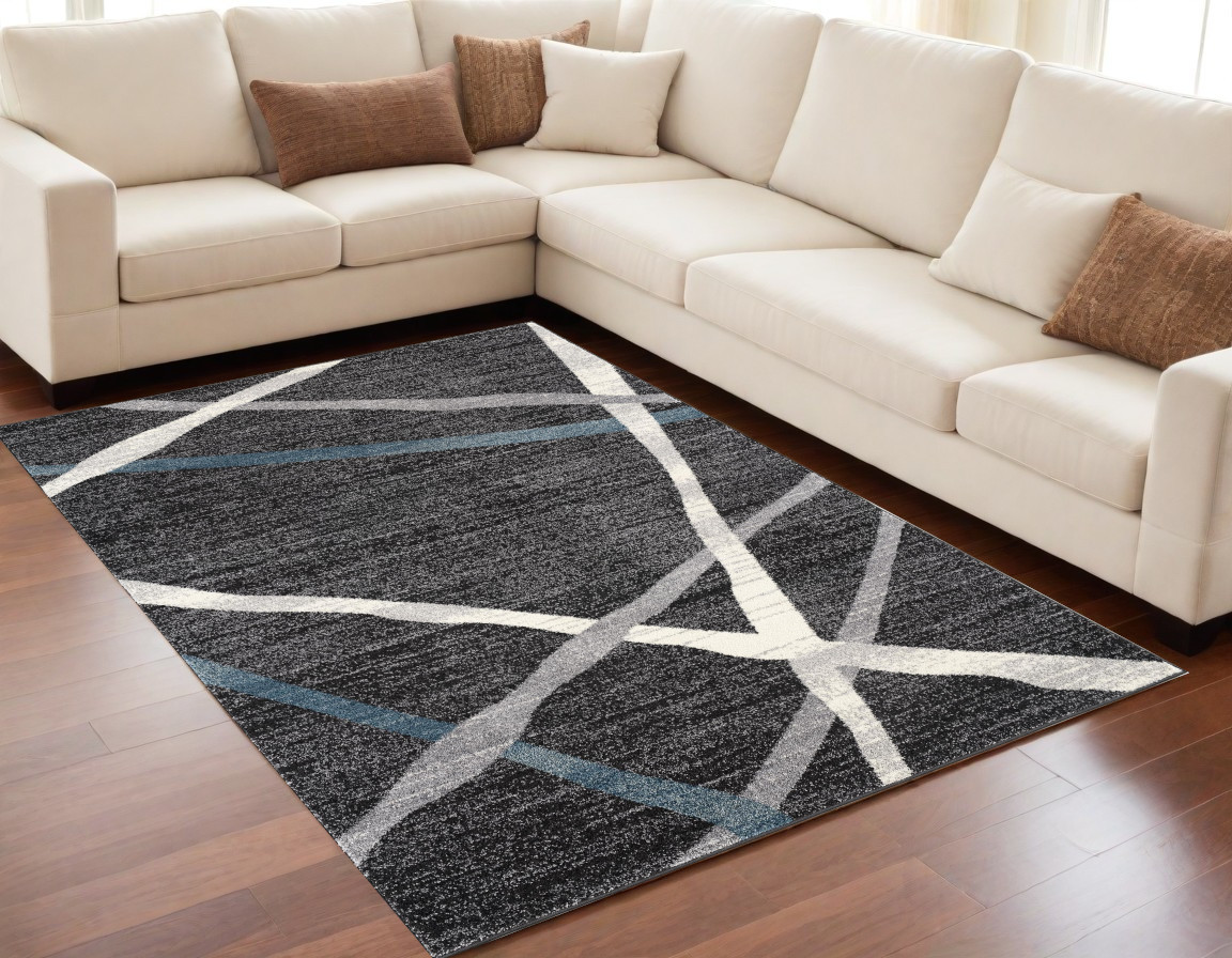 5" X 8" Distressed Black And Gray Abstract Area Rug