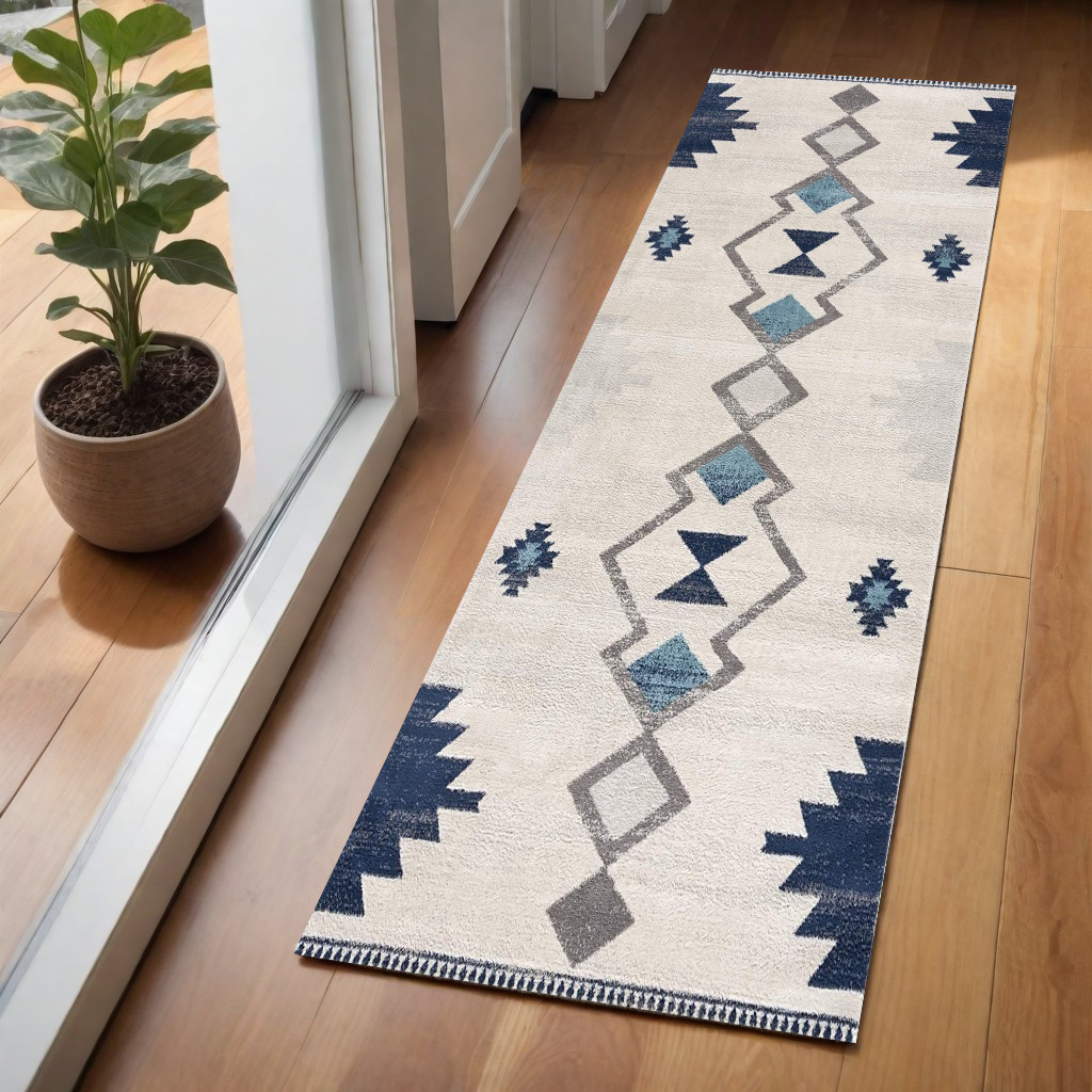 2" X 5" Blue and Ivory Southwestern Area Rug