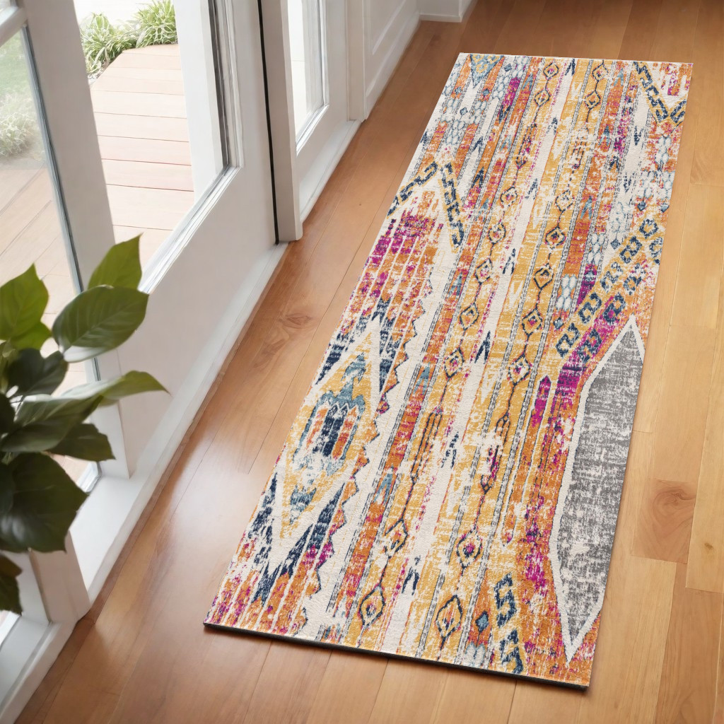 2" X 6" Gold And Ivory Southwestern Area Rug