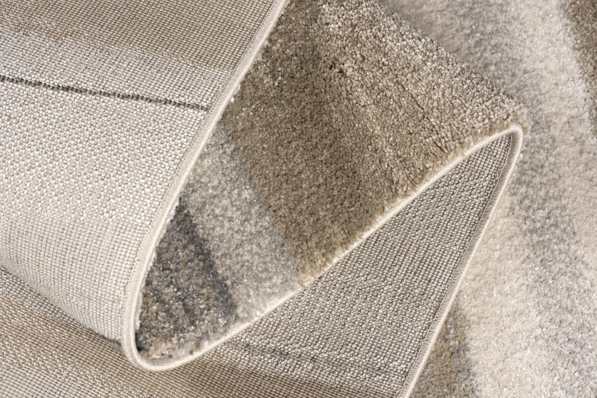 5" X 8" Cream and Tan Abstract Marble Area Rug