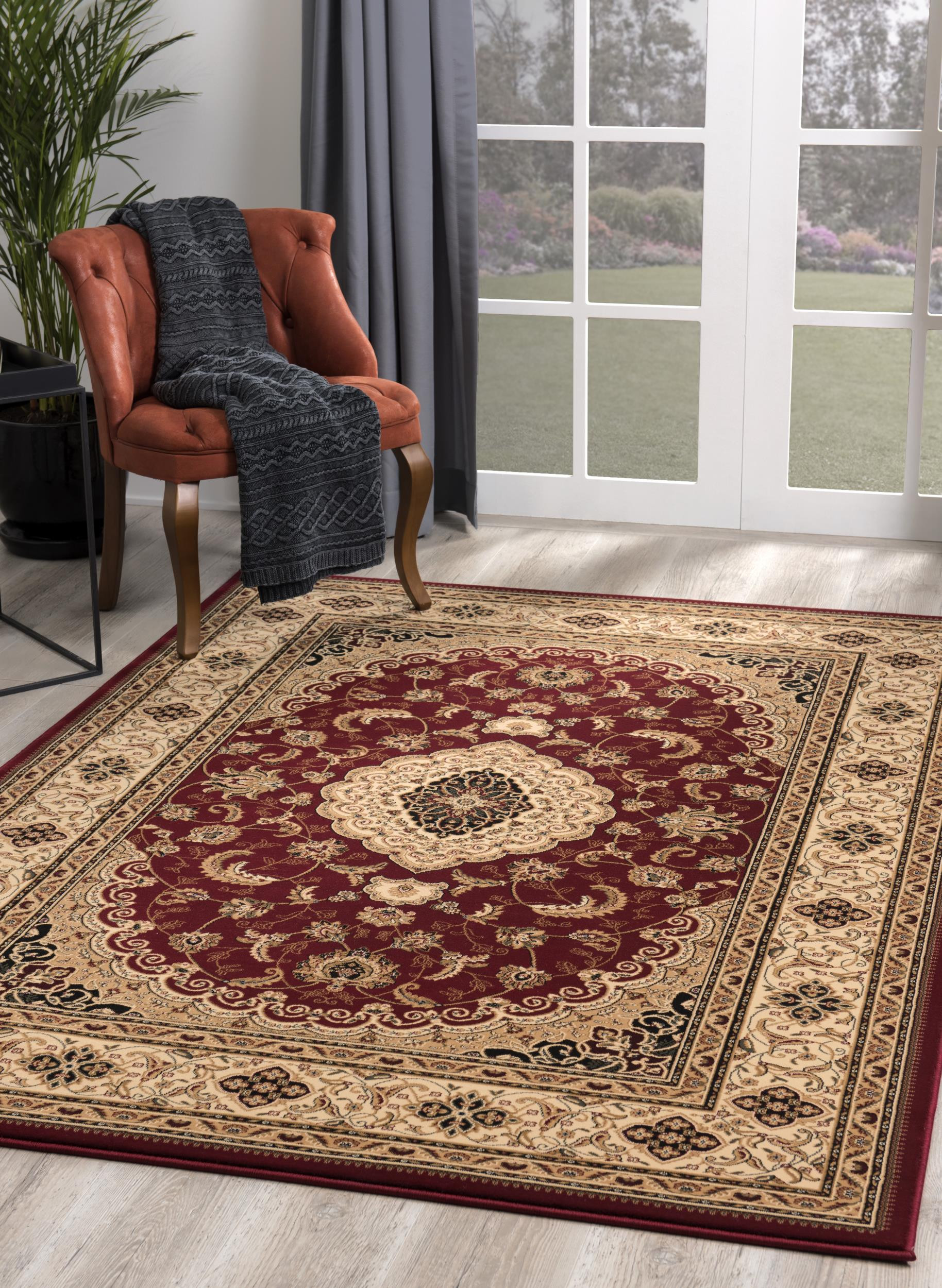 5" X 8" Red and Beige Floral Medallion Power Loom Area Rug