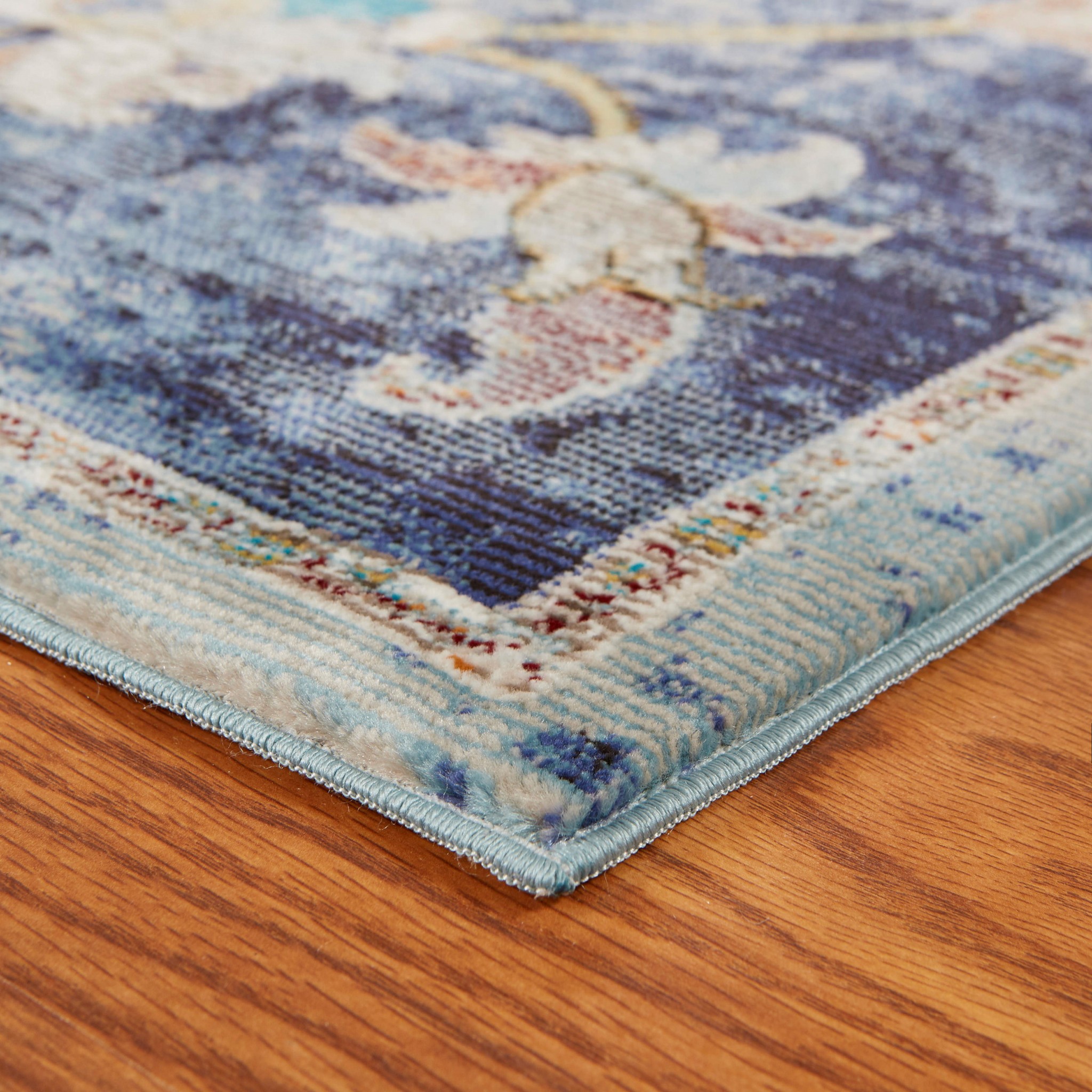 2" X 9" Blue and White Jacobean Pattern Runner Rug