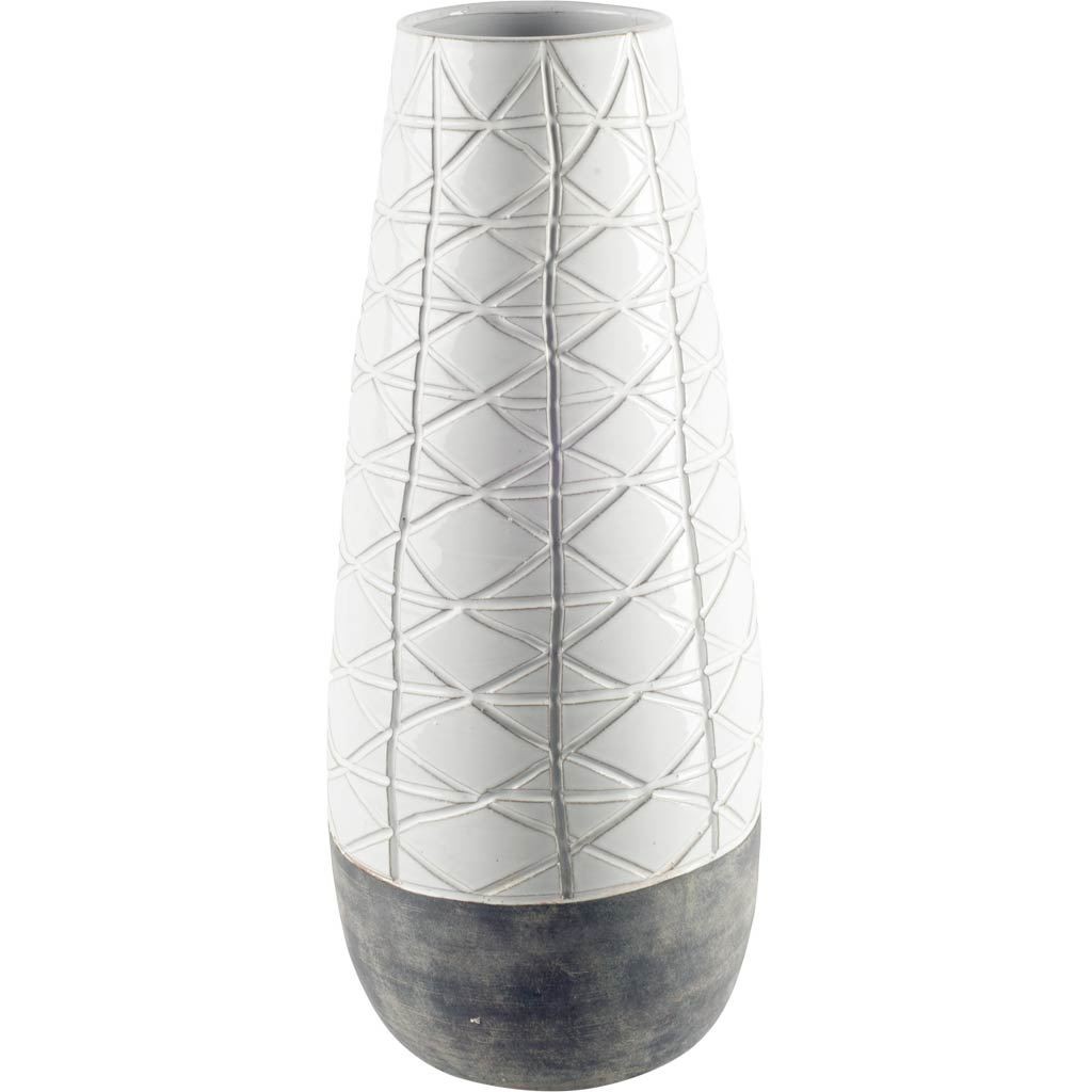 Carved Textured White Ceramic Vase Over Dark Clay