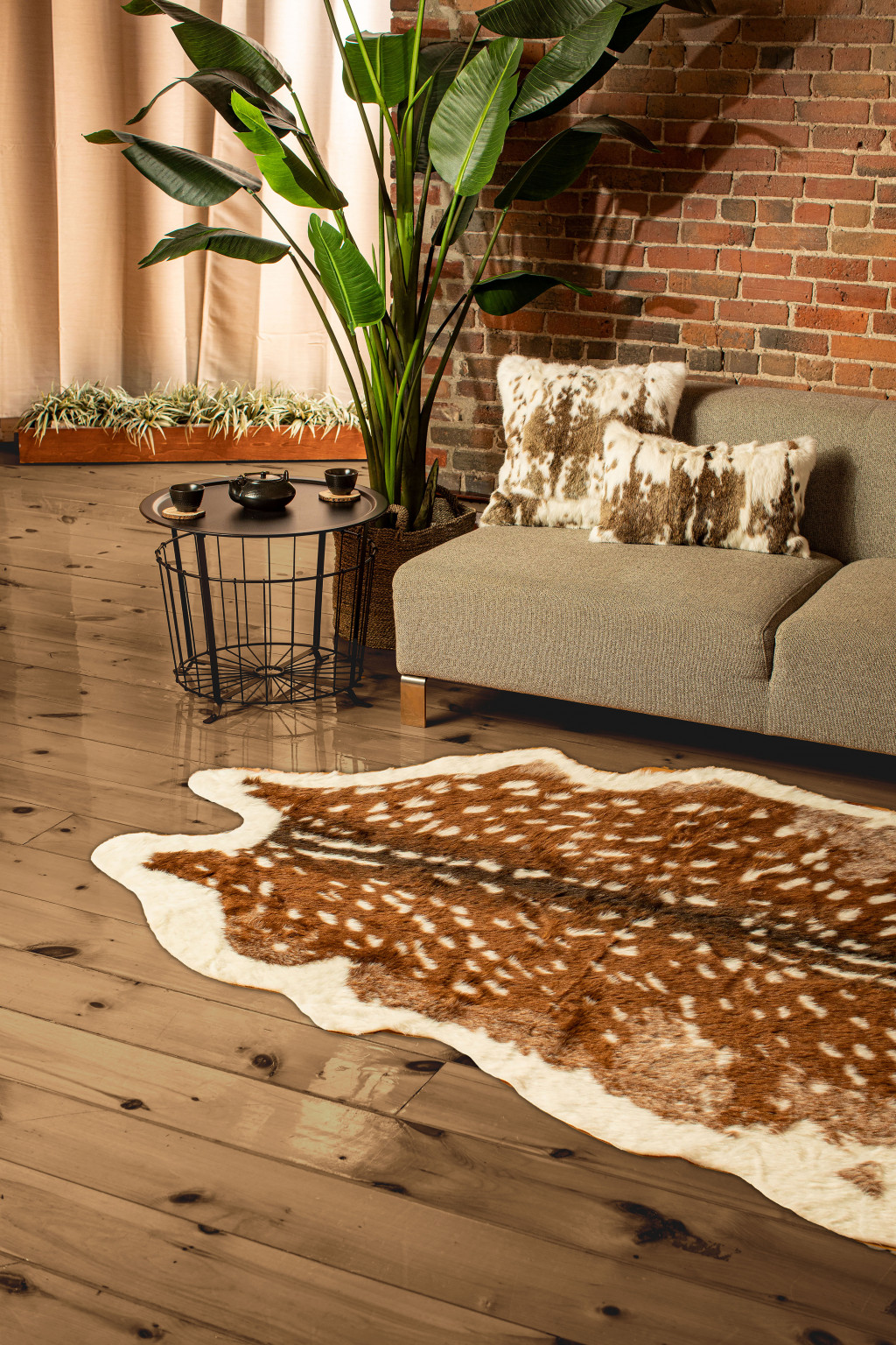 5" X 8" Off White And Brown Faux Cowhide Tufted Washable Non Skid Area Rug