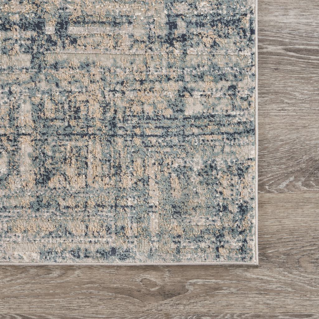 8 X 11 cream Blue And Ivory geometric Distressed Stain Resistant Area Rug