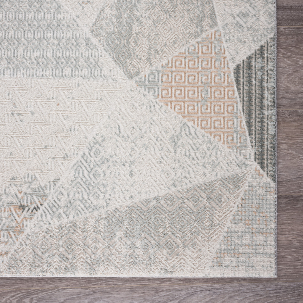2" X 3" Gray Blue Taupe And Cream Geometric Distressed Stain Resistant Area Rug
