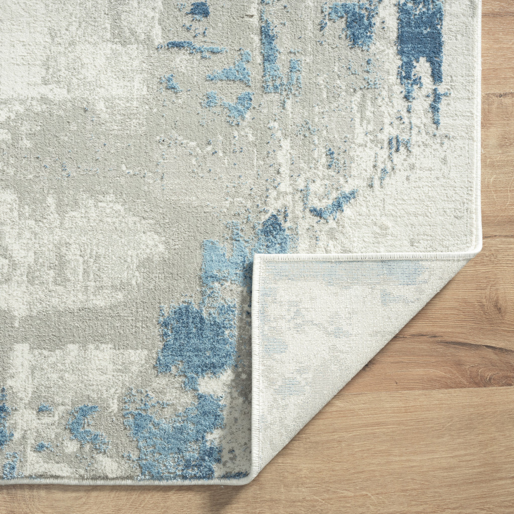4" X 6" Ivory Gray And Blue Abstract Stain Resistant Area Rug