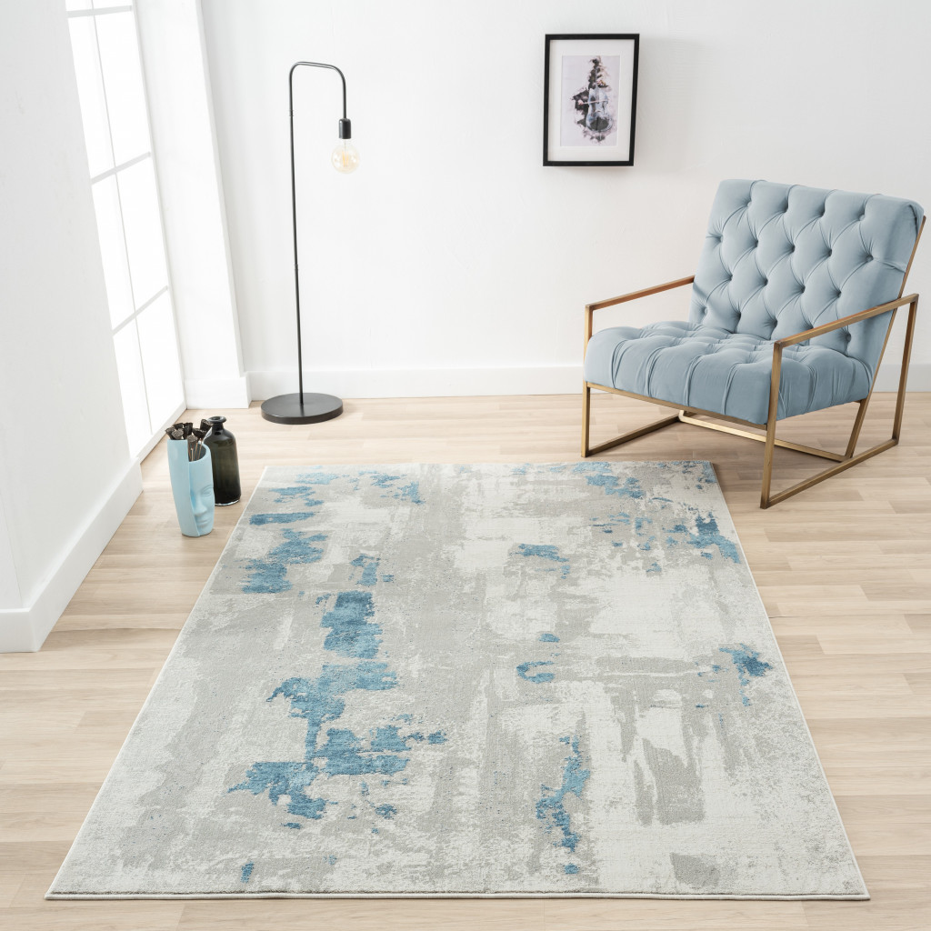 4" X 6" Ivory Gray And Blue Abstract Stain Resistant Area Rug