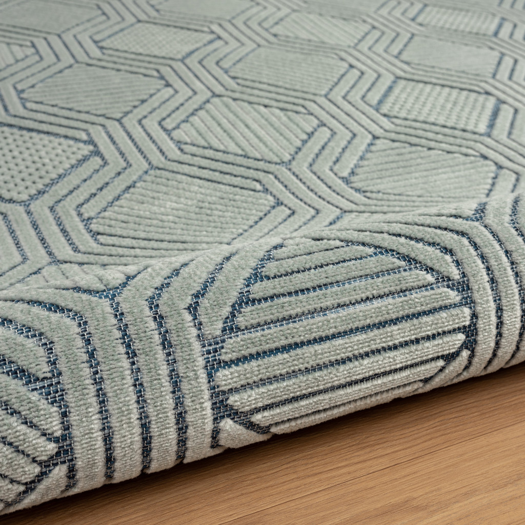 5" X 7" Light Blue And Navy Geometric Stain Resistant Area Rug