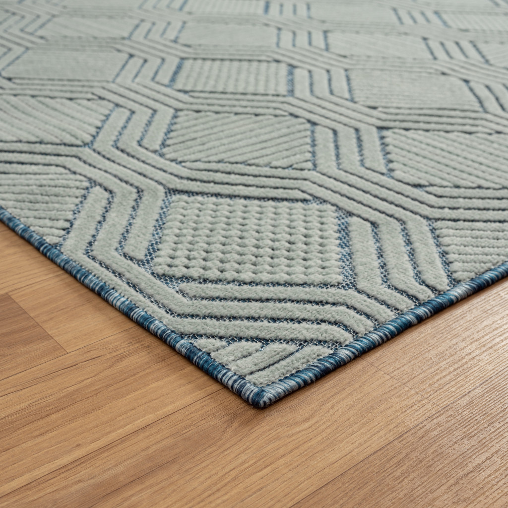 5" X 7" Light Blue And Navy Geometric Stain Resistant Area Rug