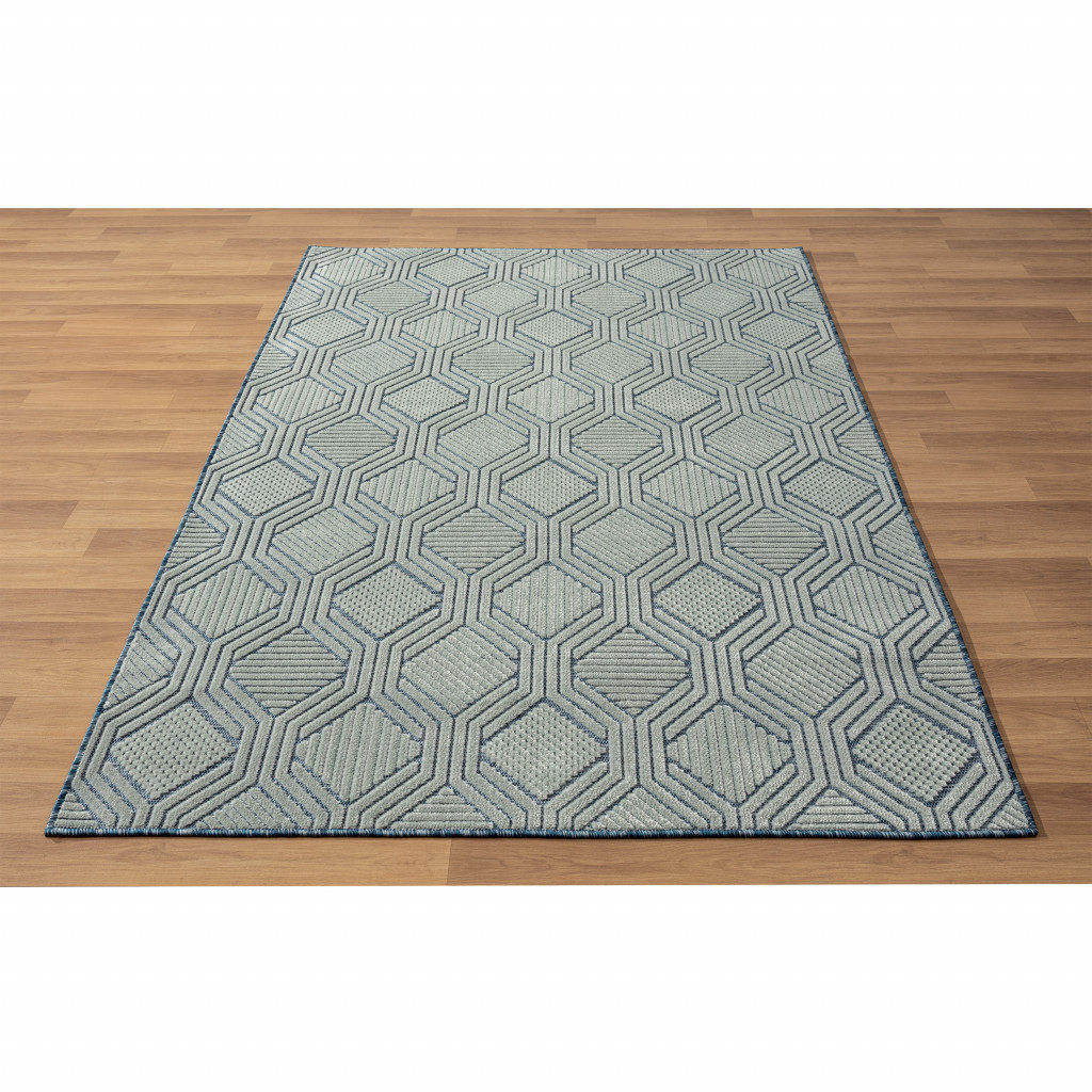 5" X 7" Light Blue And Navy Geometric Stain Resistant Area Rug