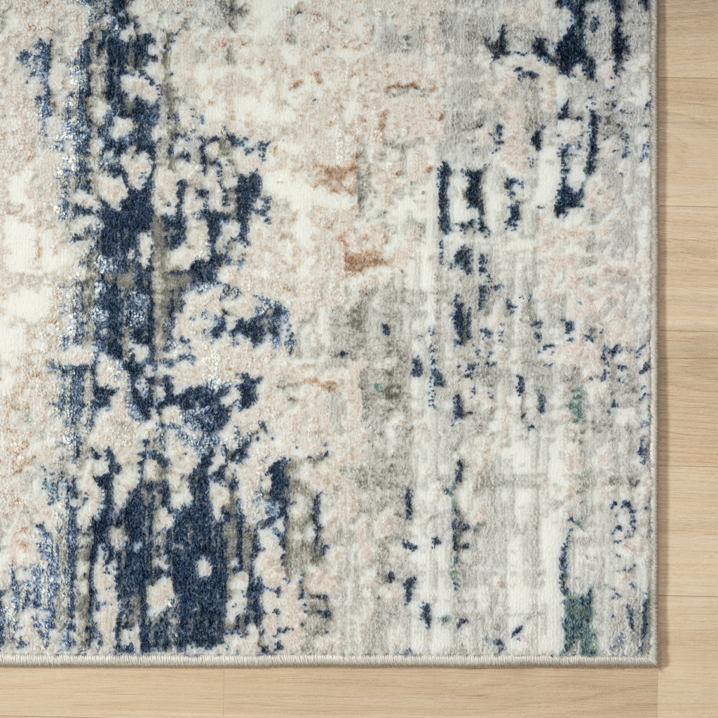 5 X 7 Beige cream Blue And gray Abstract Stain Resistant Area Rug