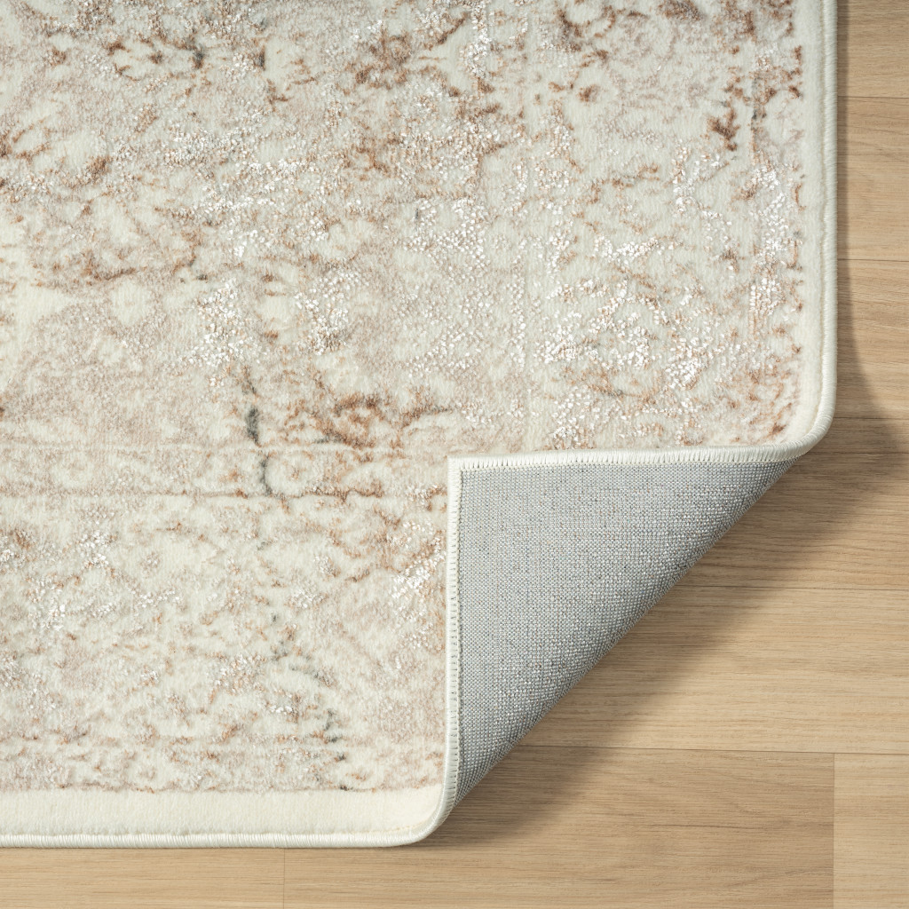 7" X 9" Beige Cream And Brown Damask Stain Resistant Area Rug