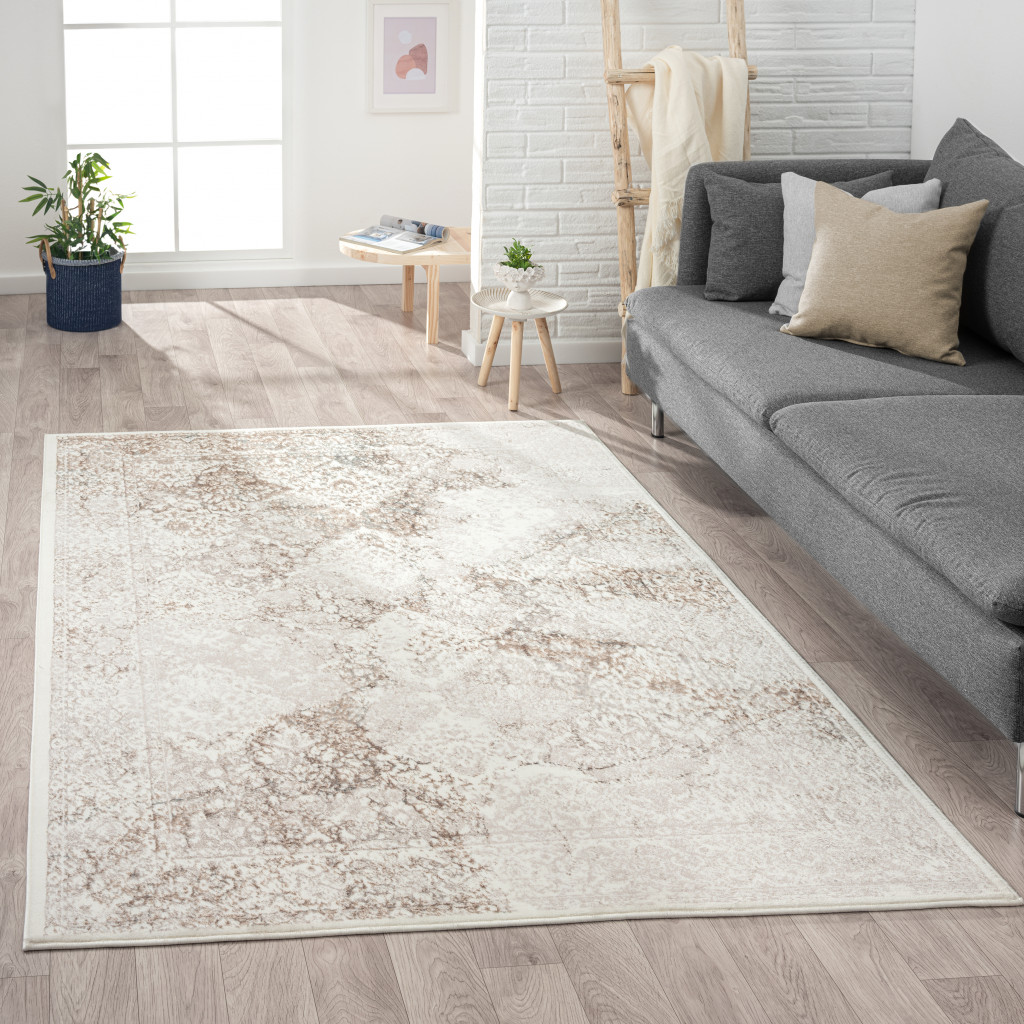 7" X 9" Beige Cream And Brown Damask Stain Resistant Area Rug