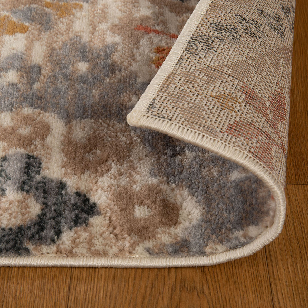 8" Ivory Orange And Gray Floral Stain Resistant Runner Rug