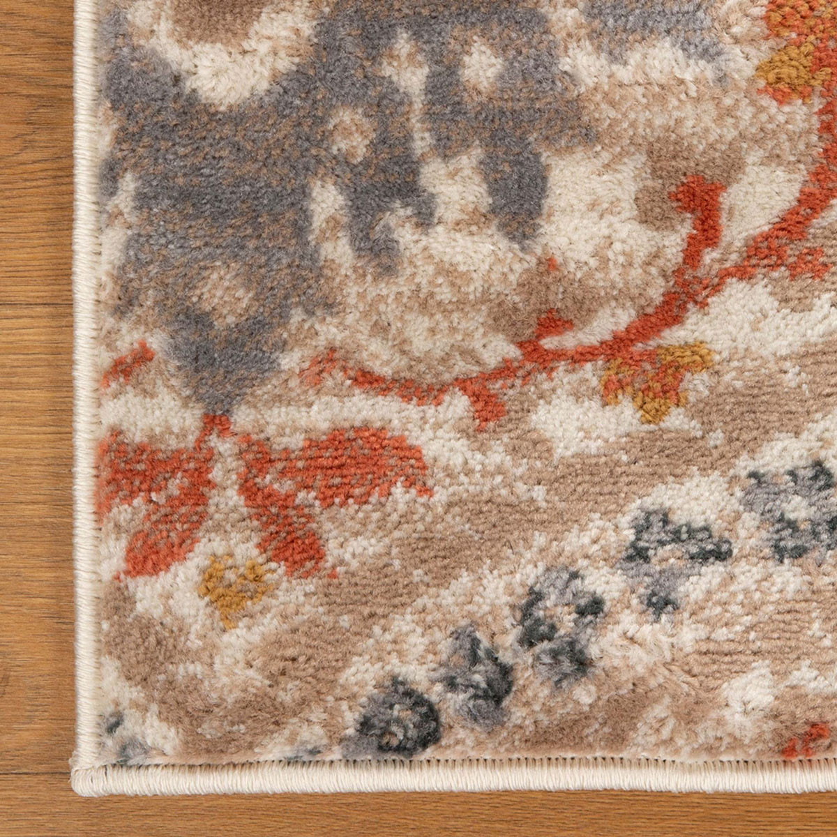 8" Ivory Orange And Gray Floral Stain Resistant Runner Rug