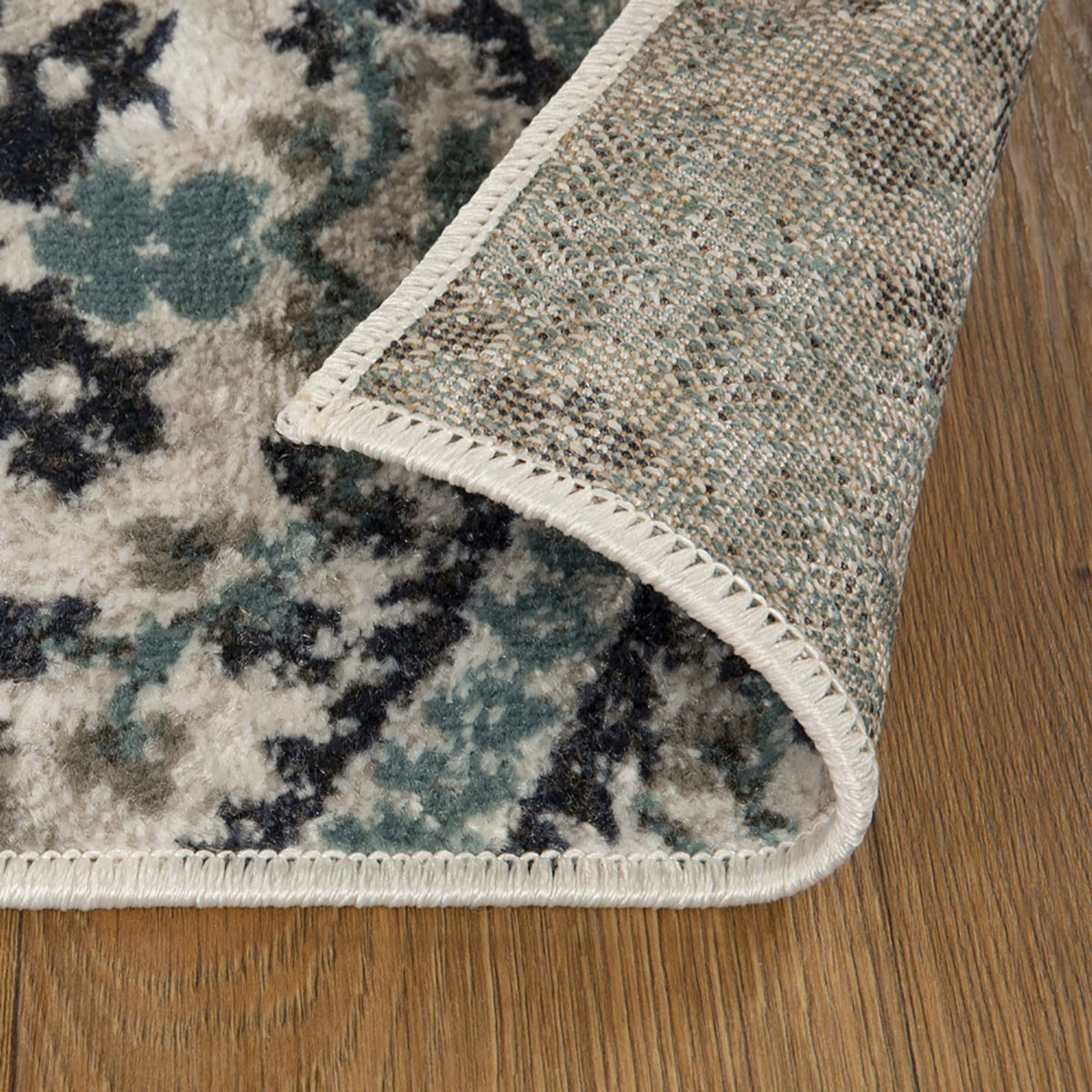 7" X 9" Ivory Blue And Gray Floral Stain Resistant Area Rug